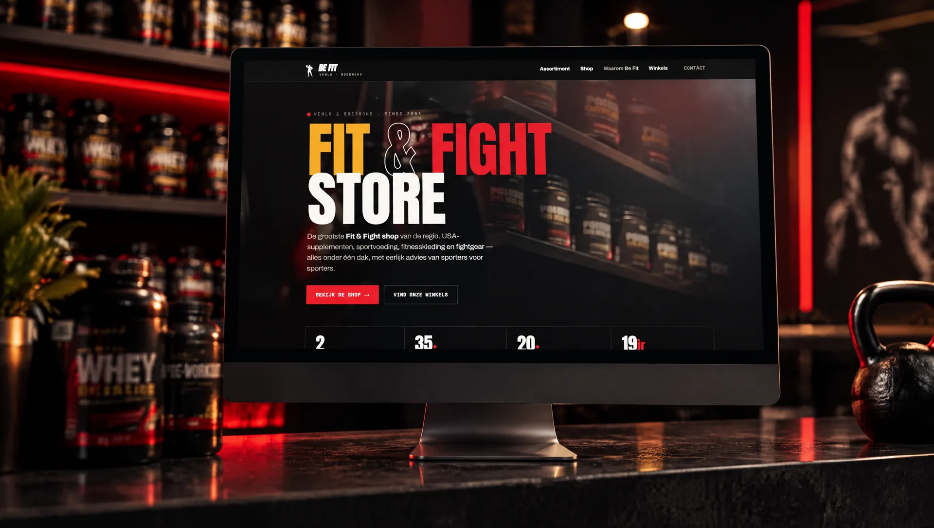 Monitor in een sportwinkel met het websiteconcept van Be Fit Store